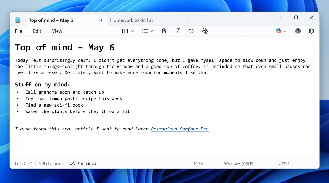 Giao diện ứng dụng Notepad trên Windows hiển thị văn bản được định dạng bằng Markdown và thanh công cụ định dạng mới