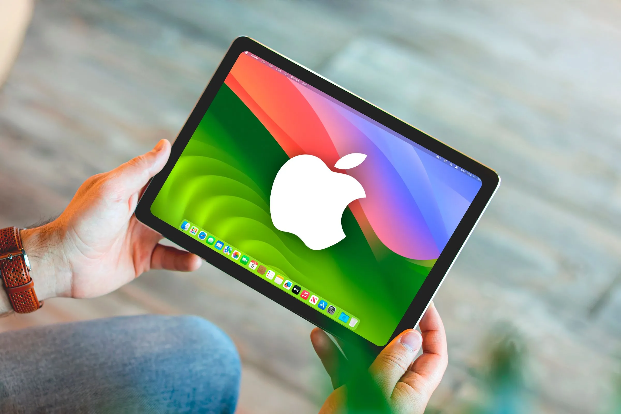 Hình ảnh minh họa một chiếc iPad hiển thị giao diện trông giống macOS, thể hiện mong muốn biến iPad thành máy tính truyền thống.