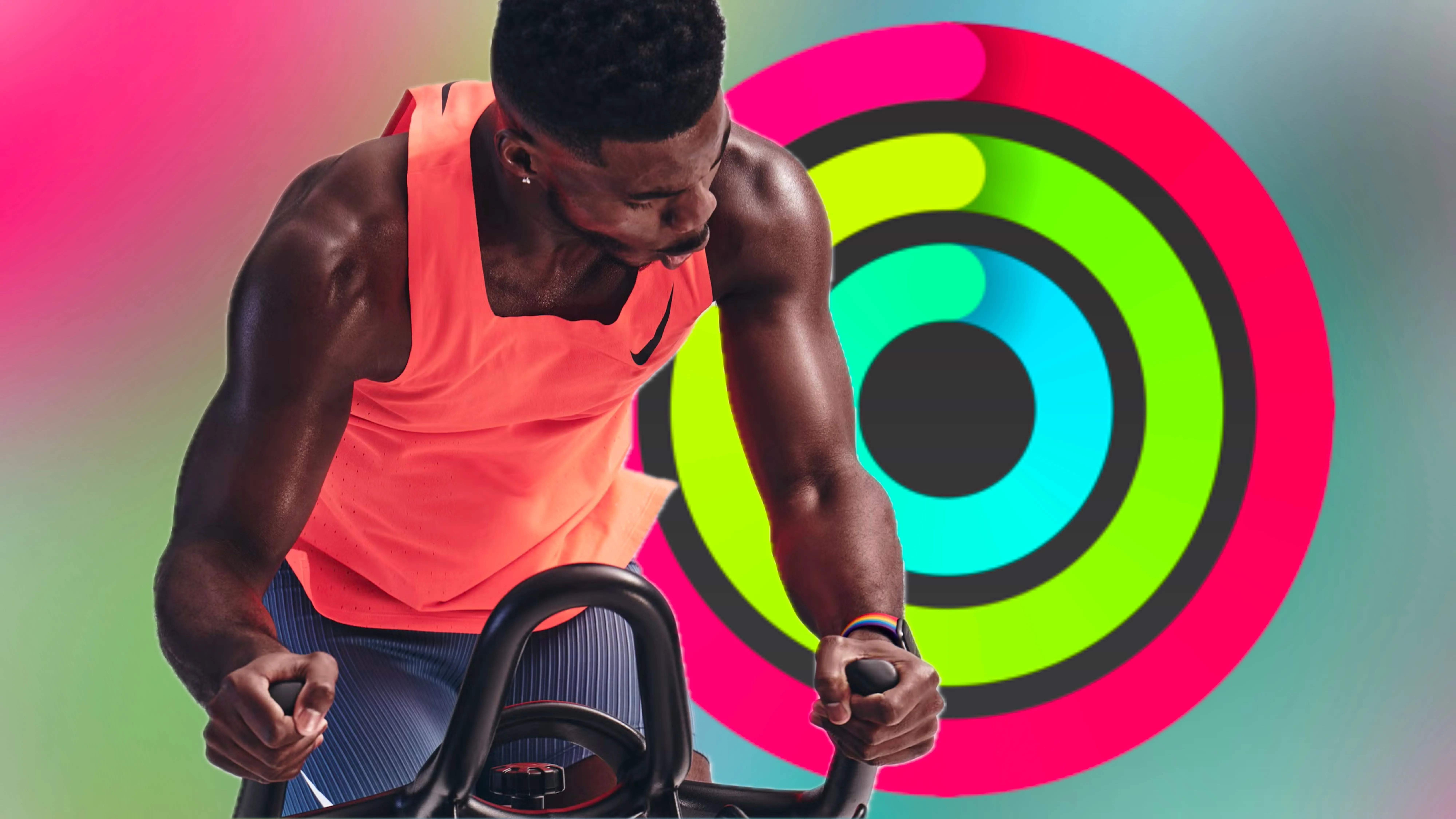 Huấn luyện viên Apple Fitness+ tập luyện trước hình ảnh Vòng Hoạt động đã hoàn thành