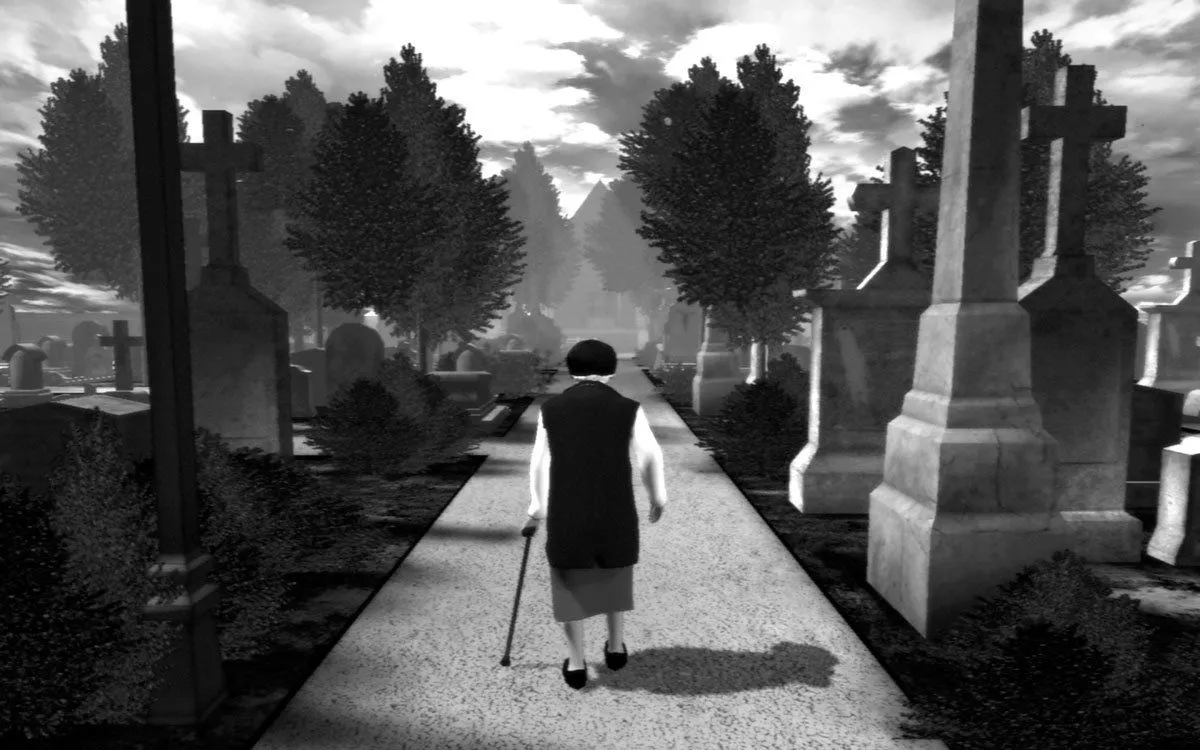 Ảnh chụp màn hình từ game The Graveyard, thể hiện một bà lão đang đi bộ giữa các bia mộ trong một nghĩa địa.