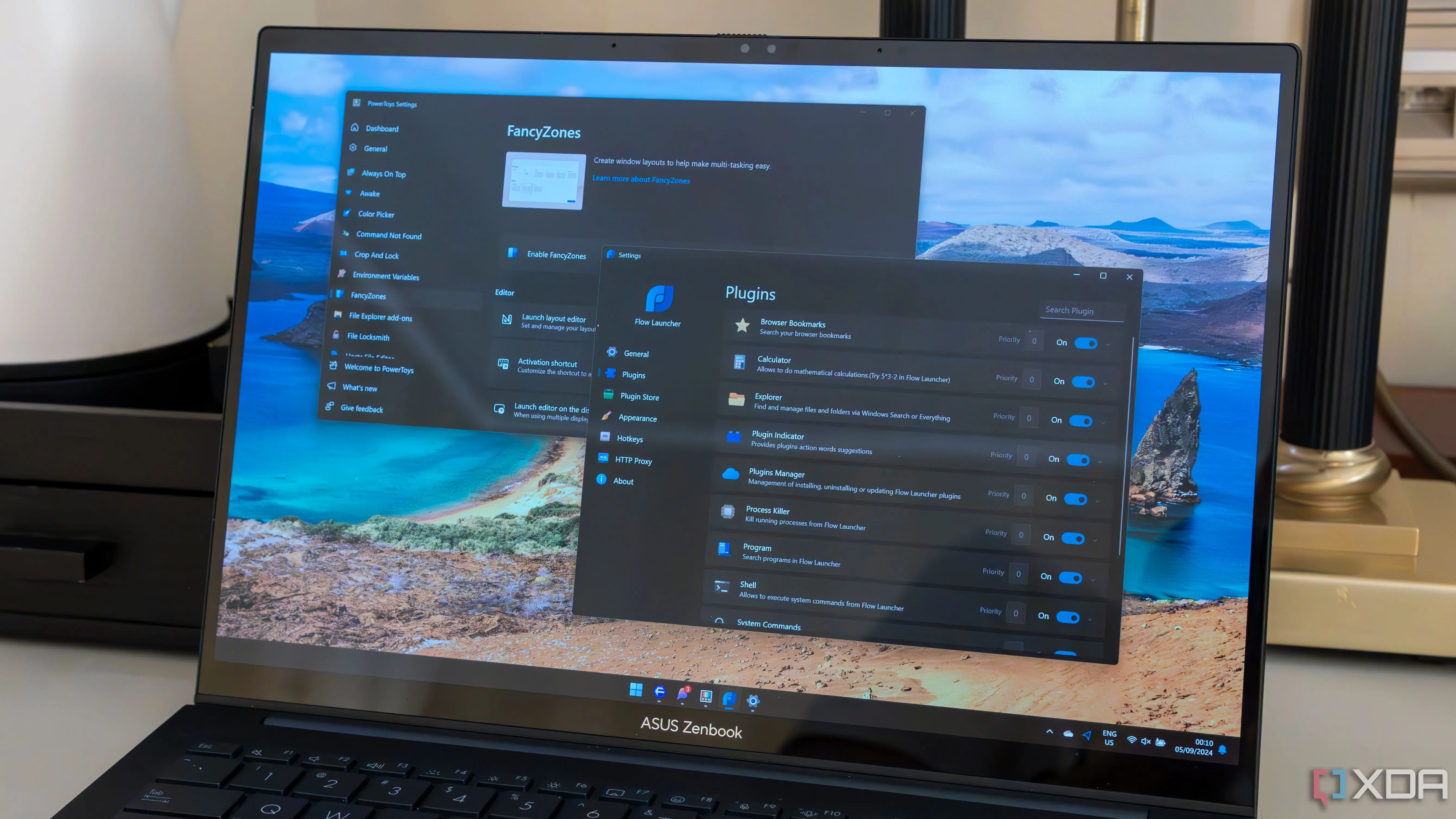 Laptop chạy Windows 11 minh họa tính năng PowerToys Run và Flow Launcher