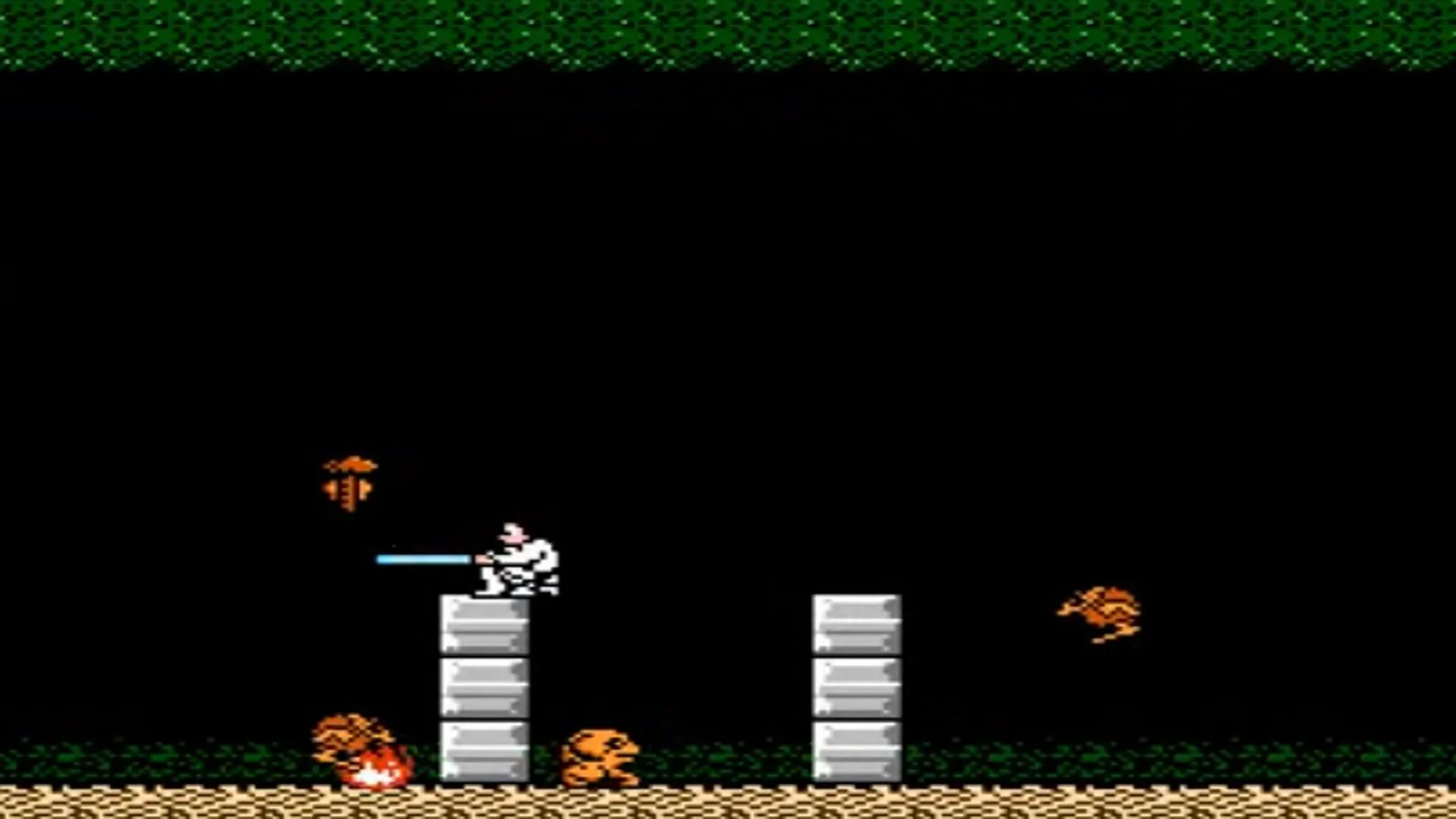 Cảnh chơi game Star Wars trên hệ máy NES, hiển thị đồ họa 8-bit và nhân vật Luke Skywalker