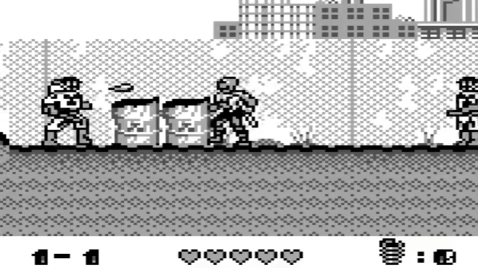 Hình ảnh gameplay game Toxic Crusaders trên Game Boy, với nhân vật Toxie đang chiến đấu