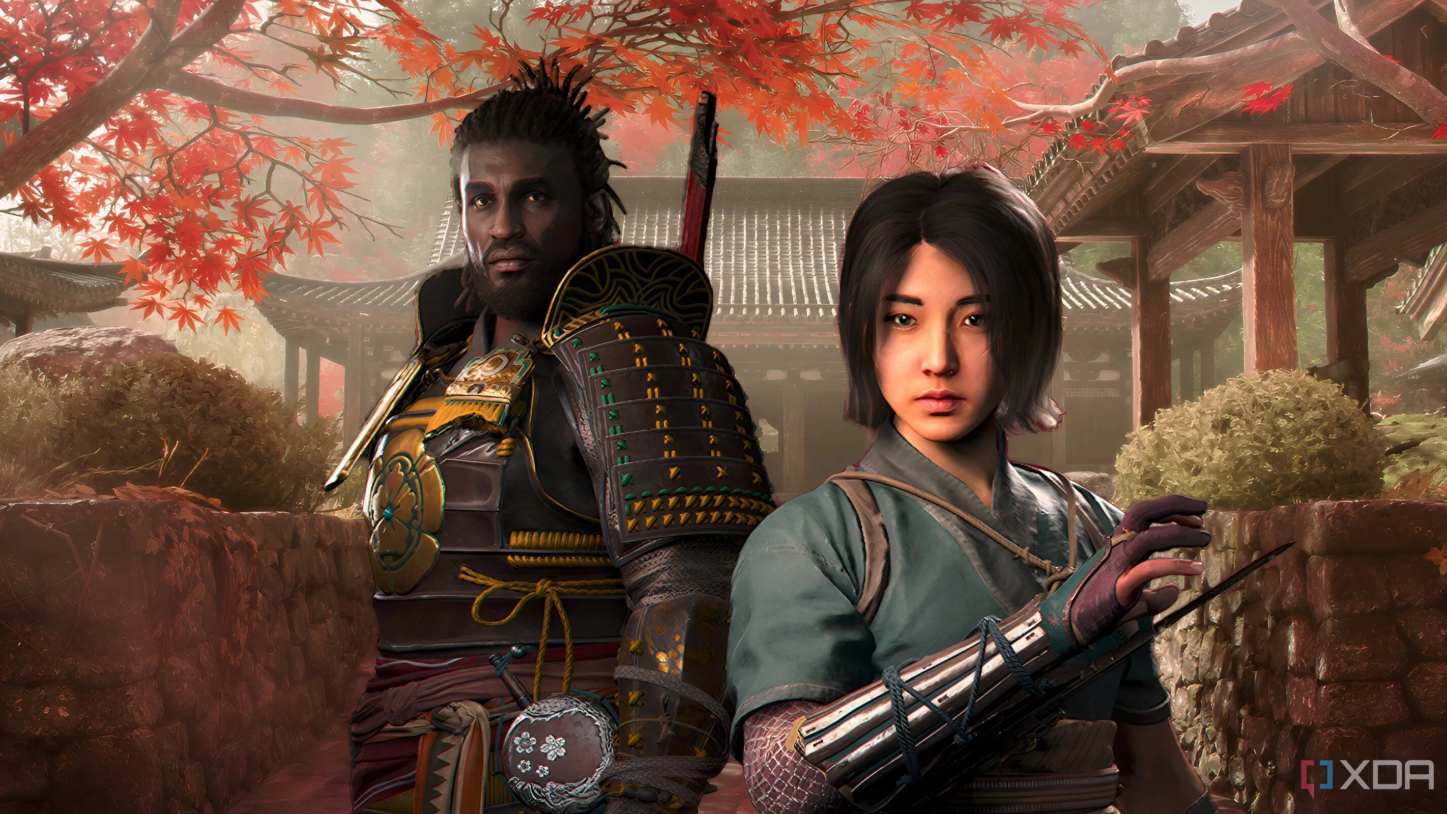 Hình ảnh nhân vật Fujibayashi Naoe và Yasuke trong bối cảnh kiến trúc và cây lá đỏ của Nhật Bản trong Assassin's Creed Shadows.