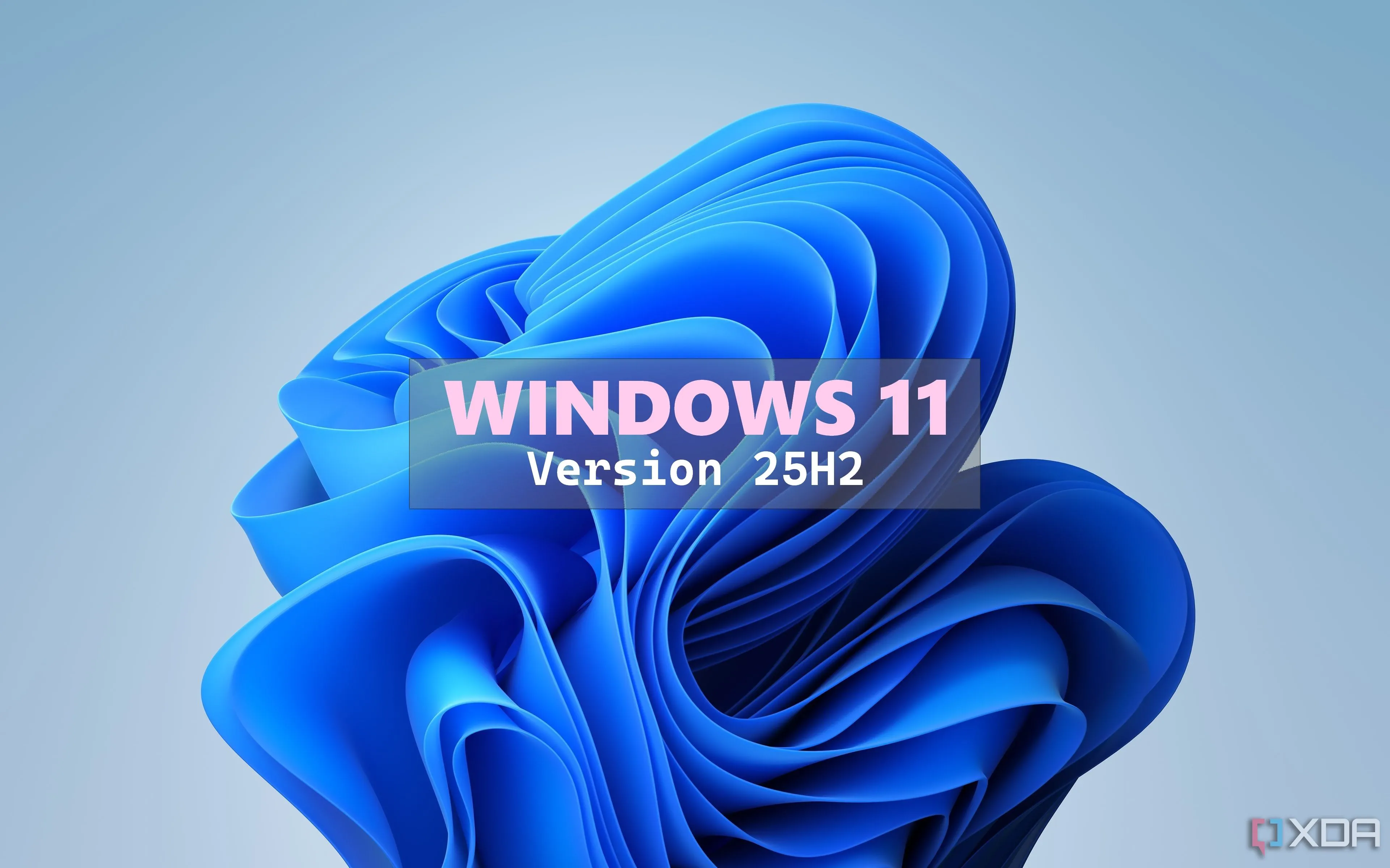 Hình nền Windows 11 Bloom với văn bản "Windows 11 Version 25H2" ở trên