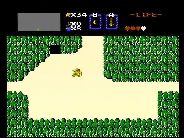 Link đang đối mặt với trùm Dodongo trong The Legend of Zelda