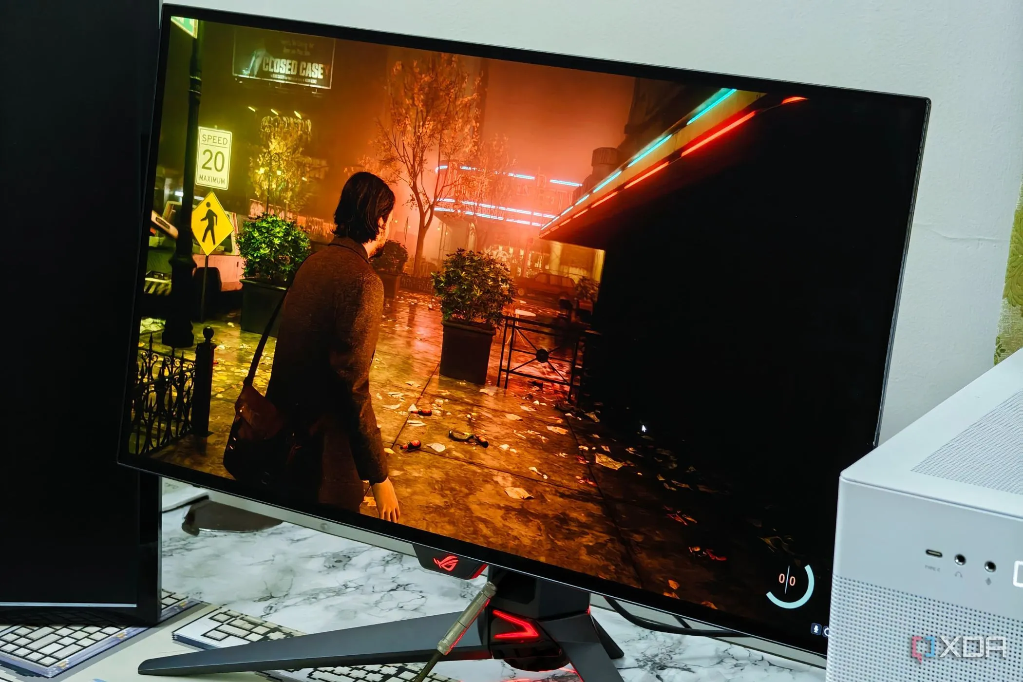 Màn hình Asus ROG PG27AQDM hiển thị đồ họa sắc nét từ game Alan Wake 2