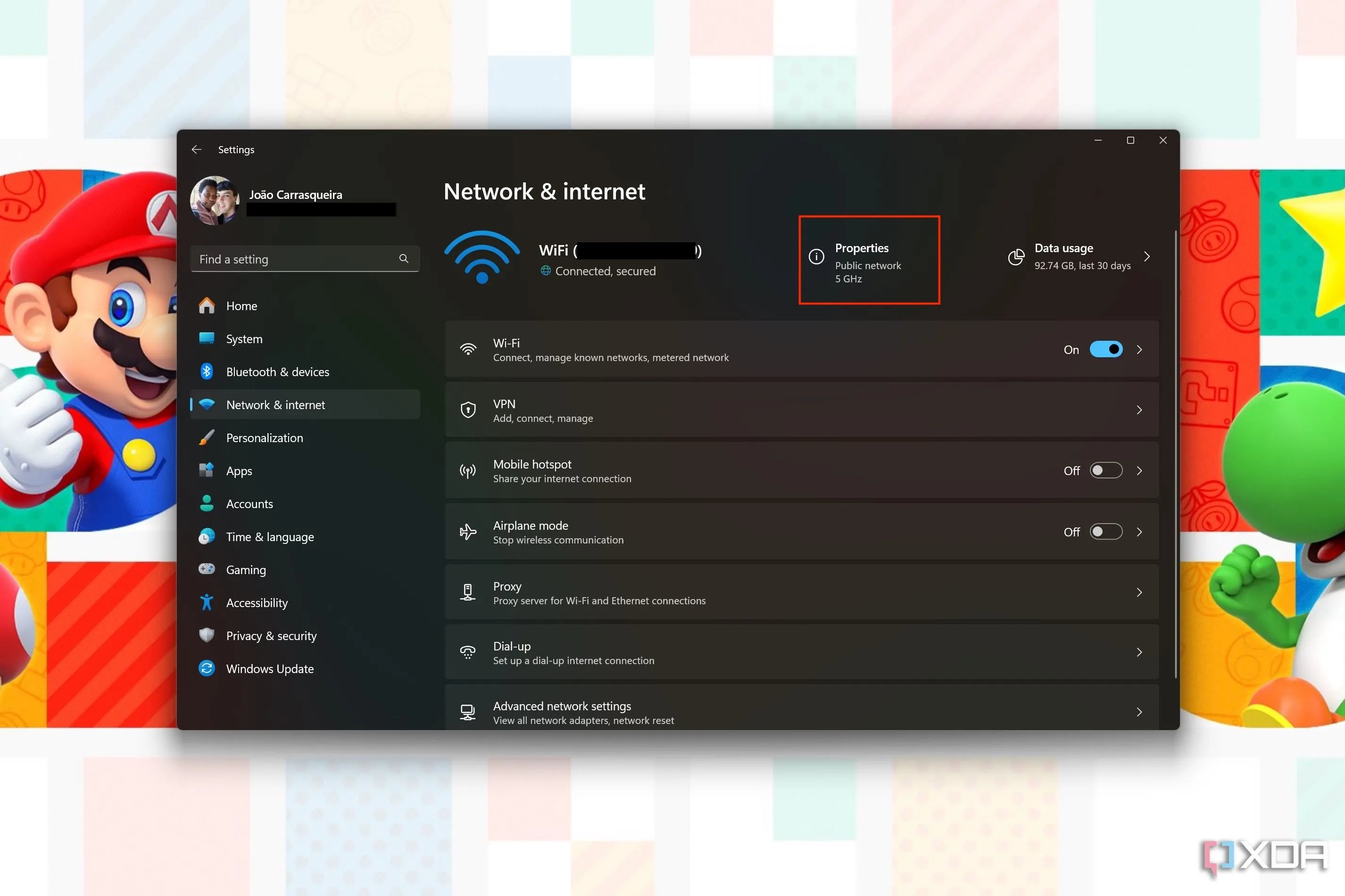 Màn hình cài đặt mạng và Internet trên Windows 11, với nút &quot;Properties&quot; của mạng Wi-Fi được tô sáng, cho biết loại mạng hiện tại
