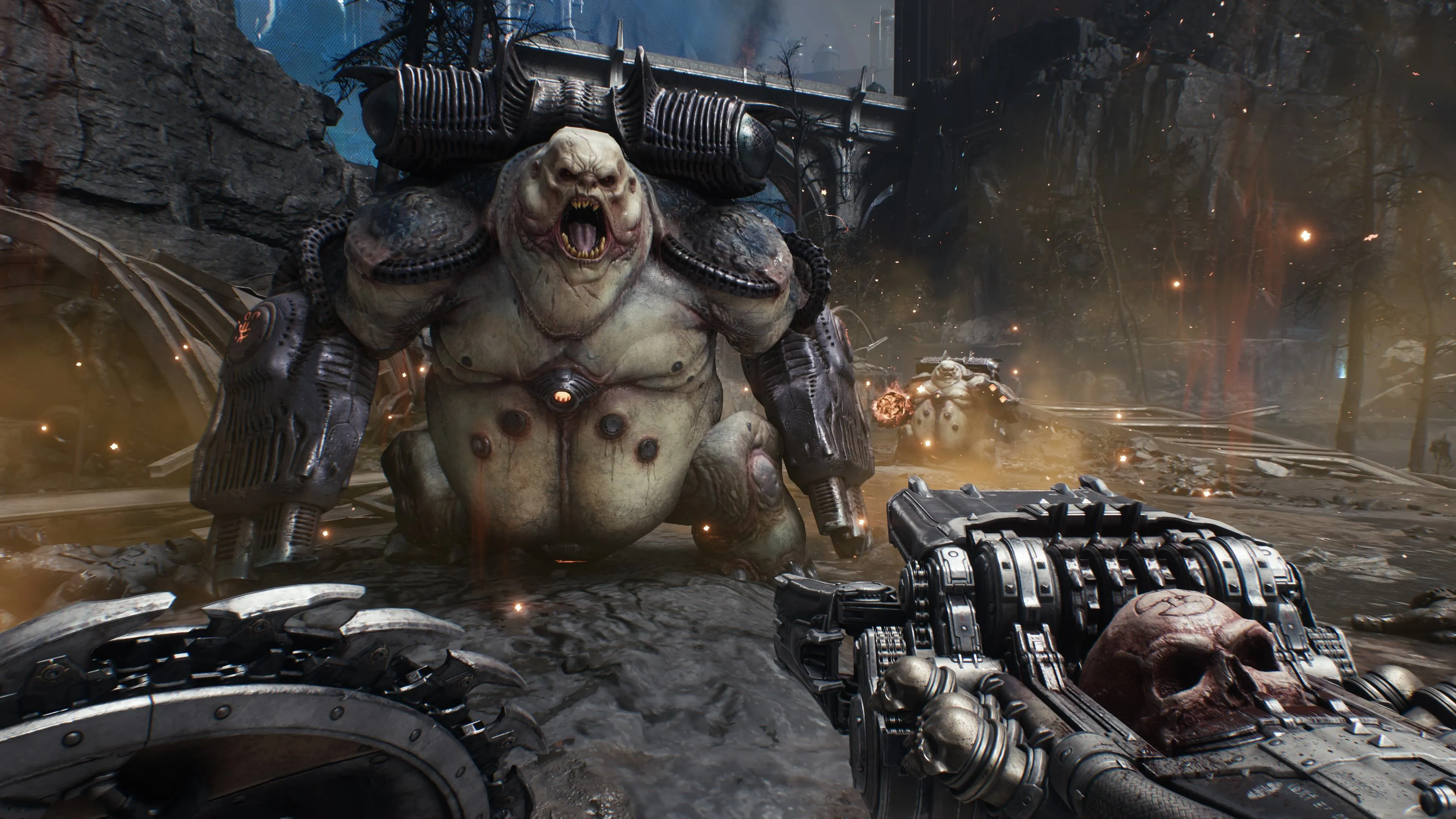 Mancubus, một kẻ thù nguy hiểm đối mặt với Doom Slayer trang bị vũ khí mới trong Doom The Dark Ages