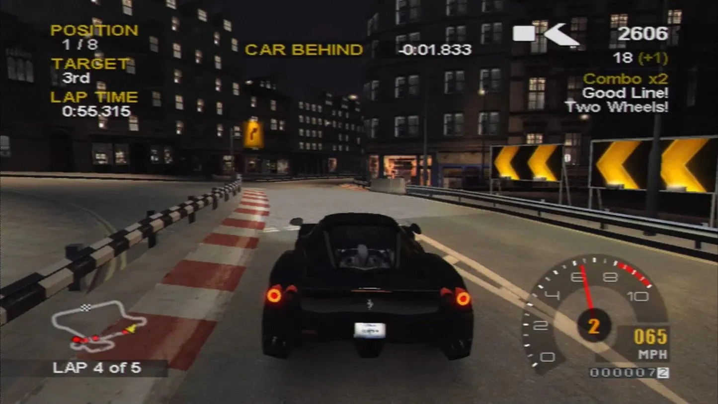 Mô tả hình ảnh: Một chiếc xe thể thao màu đen đang lao đi trên đường đua trong game Project Gotham Racing 2, thể hiện đồ họa ấn tượng của game.