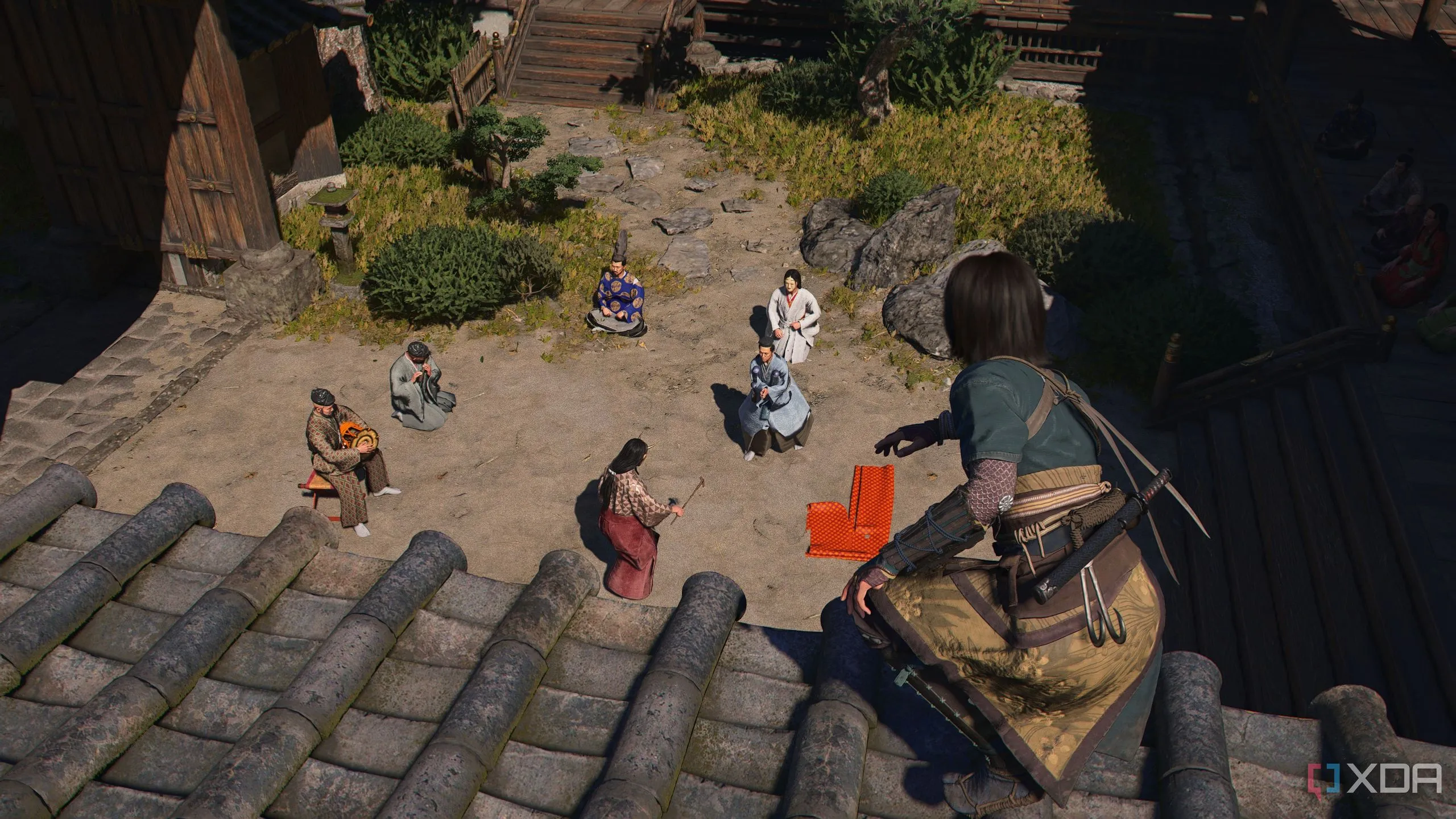 Naoe từ Assassin's Creed Shadows thực hiện động tác parkour 'Vertical Ledge Jump' mới trên mỏm đá.