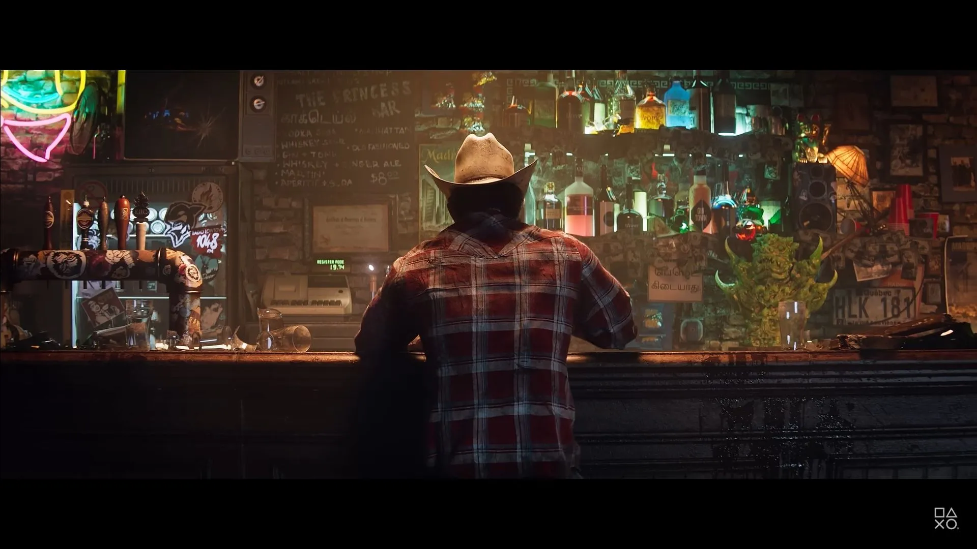 Wolverine ngồi trong quán bar tại Madripoor, một cảnh từ trailer Marvel's Wolverine